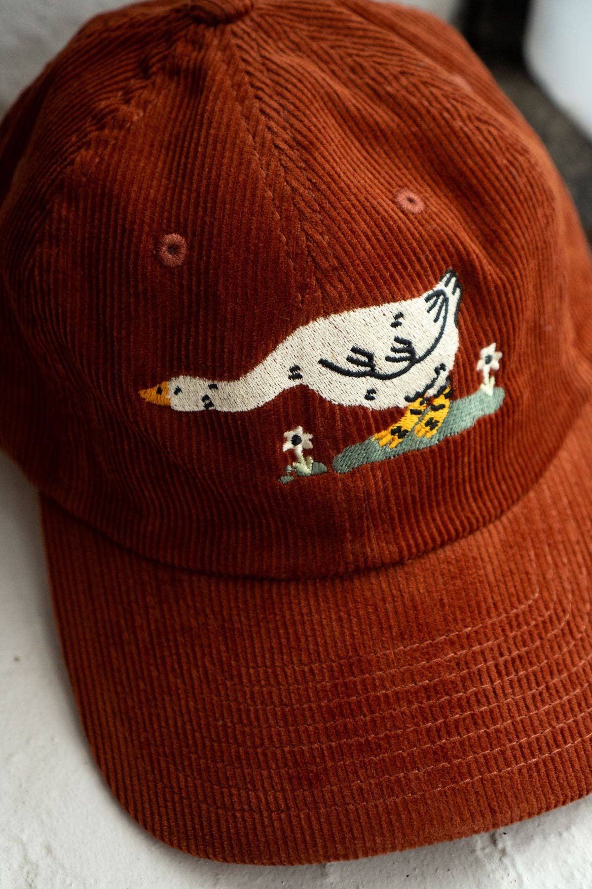 Reaching Corduroy Dad Hat | Rust | Embroidered Cord Cap